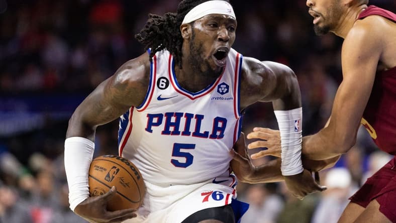 Oct 5, 2022; Philadelphia, Pennsylvania, USA; Philadelphia 76ers guard Julian Champagnie (5) drives against Cleveland Cavaliers forward Isaiah Mobley (15) during the third quarter at Wells Fargo Center. Mandatory Credit: Bill Streicher-USA TODAY Sports