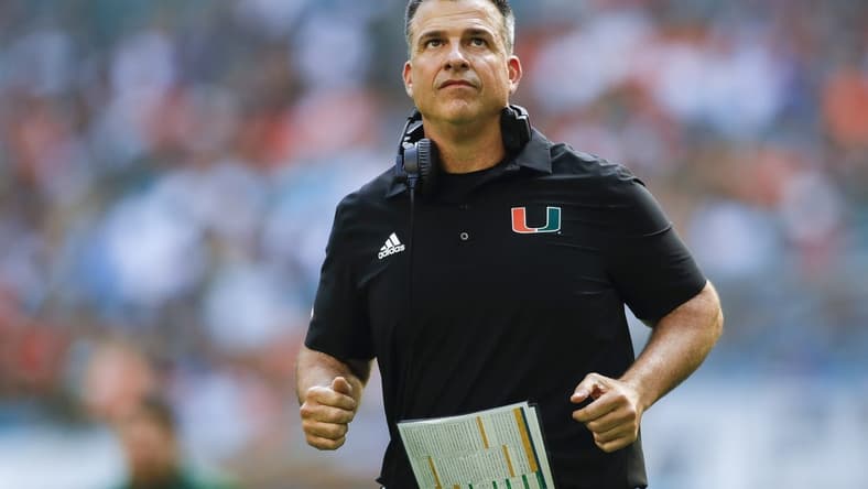 Oct 22, 2022; Miami Gardens, Florida, USA; Miami Hurricanes head coach Mario Cristobal runs on the field during the third quarter against the Duke Blue Devils at Hard Rock Stadium. Mandatory Credit: Sam Navarro-USA TODAY Sports