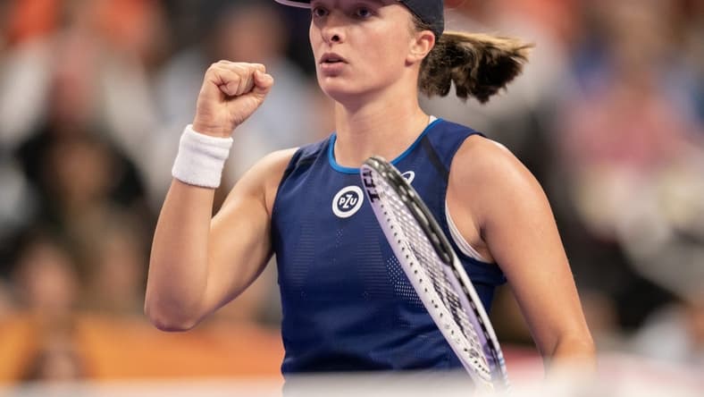 Nov 5, 2022; Forth Worth, TX, USA; Iga Swiatek (POL) reacts after a point against Coco Gauff (USA) during a match on day six of the WTA Finals at Dickies Arena. Mandatory Credit: Susan Mullane-USA TODAY Sports