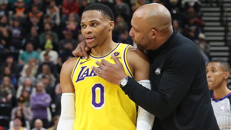 Nov 7, 2022; Salt Lake City, Utah, USA; Los Angeles Lakers head coach Darvin Ham speaks with guard Russell Westbrook (0) against the Utah Jazz in the second quarter at Vivint Arena. Mandatory Credit: Rob Gray-USA TODAY Sports