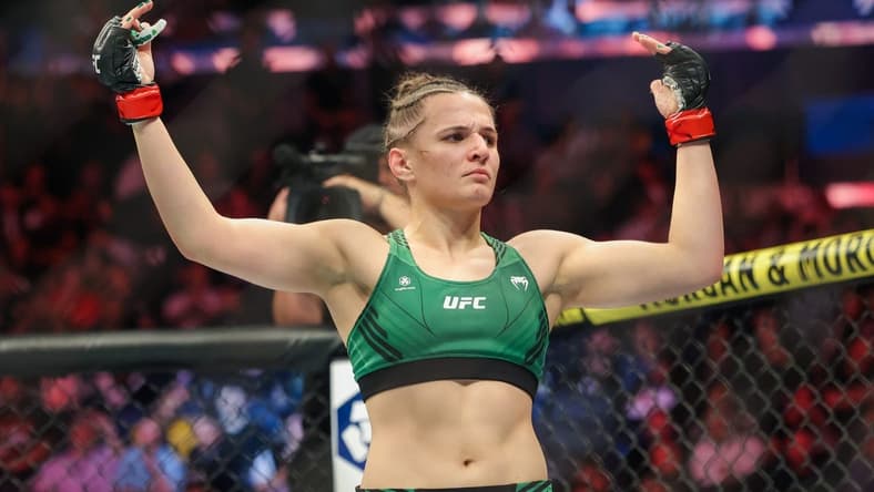 Nov 12, 2022; New York, NY, USA; Erin Blanchfield (red gloves) defeats Molly McCann (blue gloves) during UFC 281 at Madison Square Garden. Mandatory Credit: Jessica Alcheh-USA TODAY Sports
