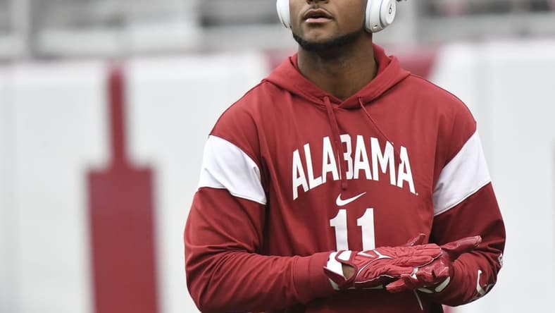 Nov 26, 2022; Tuscaloosa, Alabama, USA; Alabama wide receiver Traeshon Holden (11) goes through his pregame routine before the Crimson Tide faces Auburn at Bryant-Denny Stadium. Mandatory Credit: Gary Cosby Jr.-USA TODAY Sports