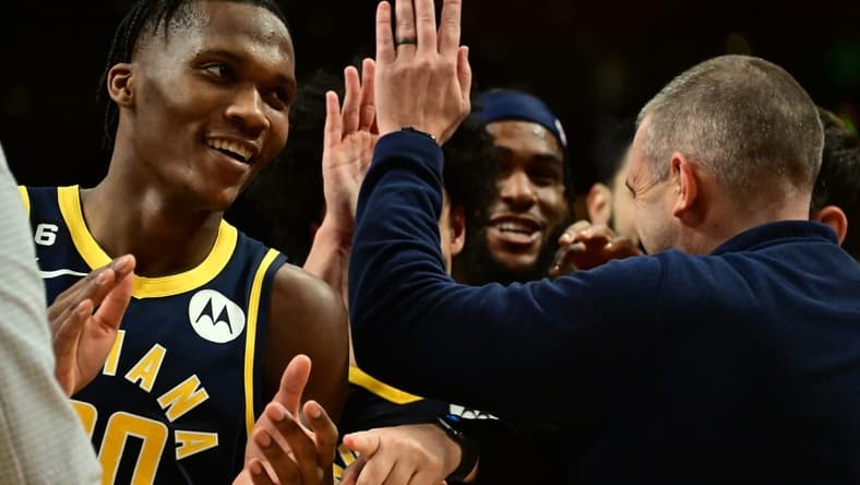 Nov 28, 2022; Los Angeles, California, USA; Indiana Pacers guard Bennedict Mathurin (00) celebrates after the game against the Los Angeles Lakers at Crypto.com Arena. Mandatory Credit: Richard Mackson-USA TODAY Sports
