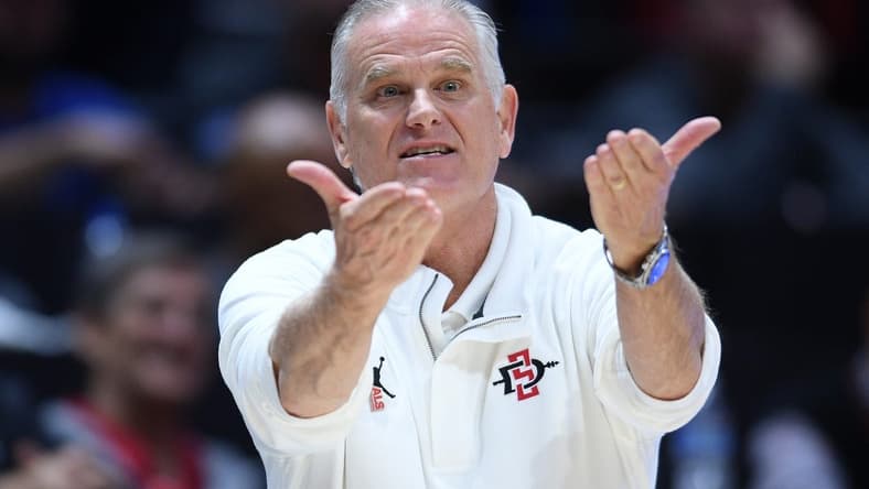 Dec 12, 2022; San Diego, California, USA; San Diego State Aztecs head coach Brian Dutcher gestures during the second half against the Kennesaw State Owls at Viejas Arena. Mandatory Credit: Orlando Ramirez-USA TODAY Sports
