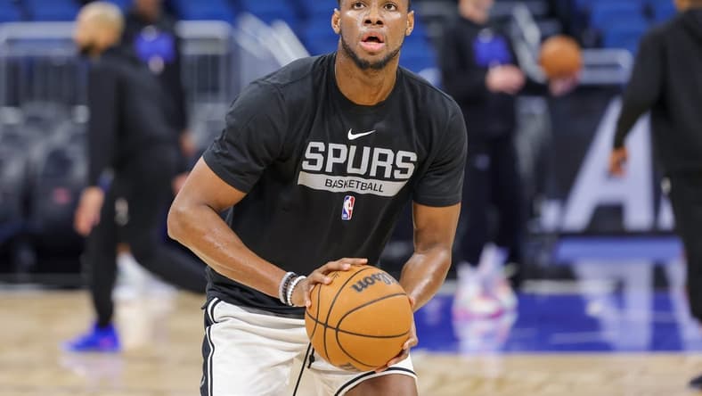 Dec 23, 2022; Orlando, Florida, USA; San Antonio Spurs center Charles Bassey (28) warms up before the game against the Orlando Magic at Amway Center. Mandatory Credit: Mike Watters-USA TODAY Sports