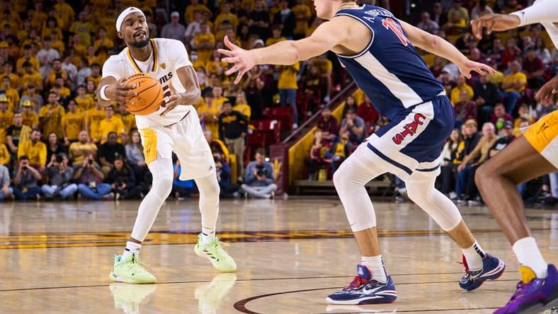 Dec 31, 2022; Tempe, Arizona, USA; Arizona State Sun Devils guard Devan Cambridge (35) looks to pass against Arizona Wildcats forward Azuolas Tubelis (10) at Desert Financial Arena on Saturday, Dec. 31, 2022. Mandatory Credit: Alex Gould/The Republic

Basketball Asu Ua Men Bb Arizona At Arizona State