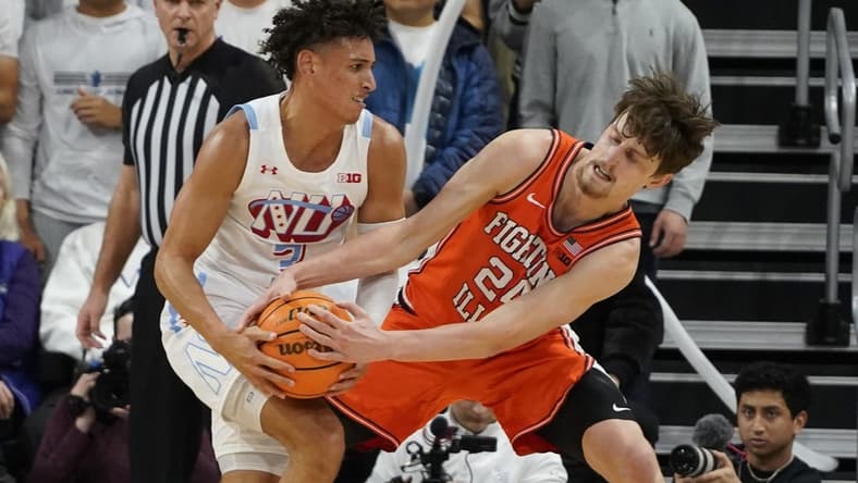 Jan 4, 2023; Evanston, Illinois, USA; Northwestern Wildcats guard Ty Berry (3) and Illinois Fighting Illini forward Matthew Mayer (24) battle for the ball during the first half at Welsh-Ryan Arena. Mandatory Credit: David Banks-USA TODAY Sports