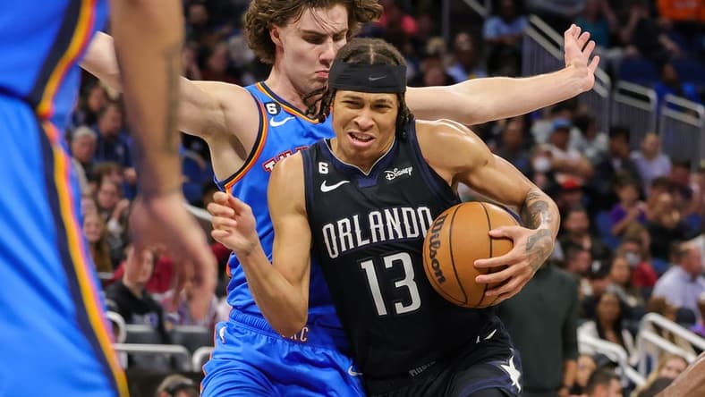 Jan 4, 2023; Orlando, Florida, USA; Orlando Magic guard R.J. Hampton (13) is fouled by Oklahoma City Thunder guard Josh Giddey (3) during the second half at Amway Center. Mandatory Credit: Mike Watters-USA TODAY Sports