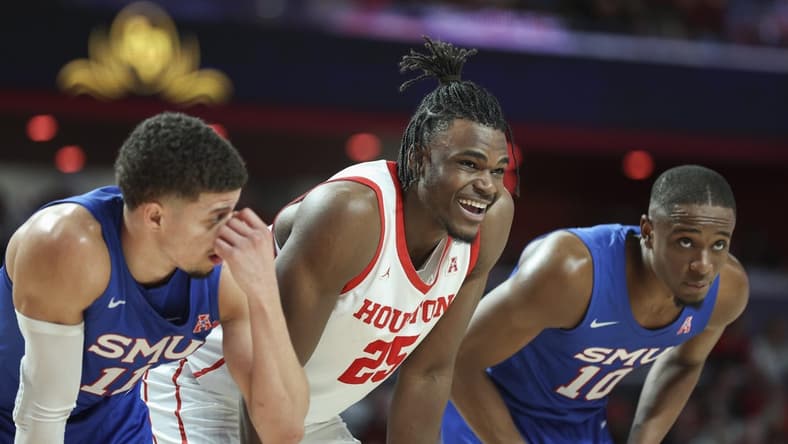 Jan 5, 2023; Houston, Texas, USA; Houston Cougars forward Jarace Walker (25) smiles during the second half against the Southern Methodist Mustangs at Fertitta Center. Mandatory Credit: Troy Taormina-USA TODAY Sports