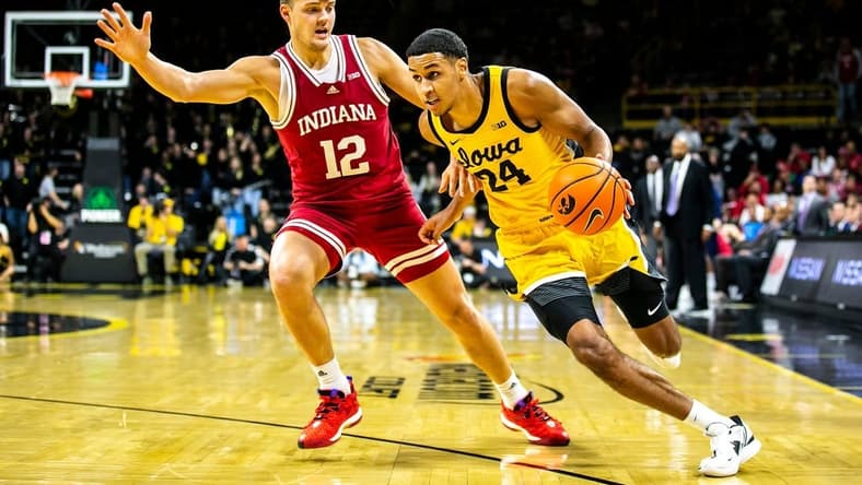 Iowa forward Kris Murray, right, drives to the basket as Indiana forward Miller Kopp defends during a NCAA Big Ten Conference men's basketball game, Thursday, Jan. 5, 2023, at Carver-Hawkeye Arena in Iowa City, Iowa.
230105 Indiana Iowa Mbb 035 Jpg