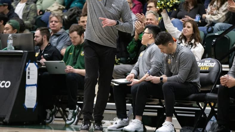 Jan 5, 2023; San Francisco, California, USA; San Francisco Dons head coach Chris Gerlufsen directs his players against the Gonzaga Bulldogs during the first half at War Memorial at the Sobrato Center. Mandatory Credit: D. Ross Cameron-USA TODAY Sports
