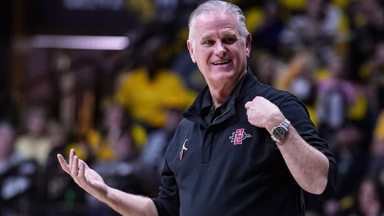 Jan 7, 2023; Laramie, Wyoming, USA; San Diego State Aztecs head coach Brian Dutcher reacts against the Wyoming Cowboys during the second half at Arena-Auditorium. Mandatory Credit: Troy Babbitt-USA TODAY Sports