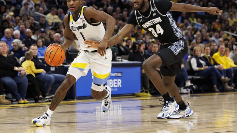 Jan 7, 2023; Milwaukee, Wisconsin, USA;  Marquette Golden Eagles guard Kam Jones (1) during the game against the Georgetown Hoyas at Fiserv Forum. Mandatory Credit: Jeff Hanisch-USA TODAY Sports