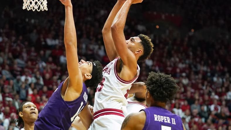 Jan 8, 2023; Bloomington, Indiana, USA; Indiana Hoosiers forward Trayce Jackson-Davis (23) scores over Northwestern Wildcats forward Tydus Verhoeven (10) during the first half at Simon Skjodt Assembly Hall. Mandatory Credit: Robert Goddin-USA TODAY Sports