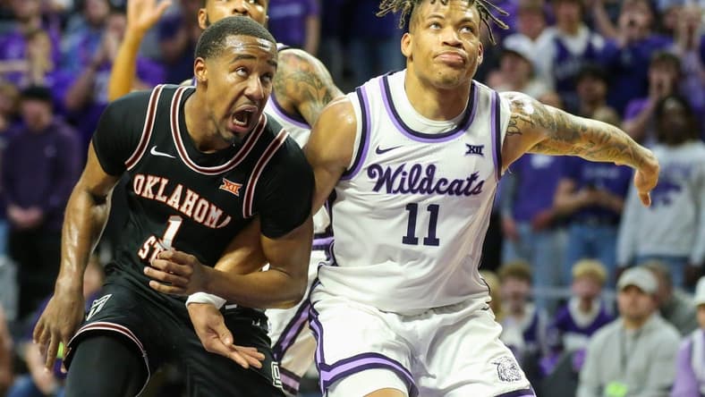 Jan 10, 2023; Manhattan, Kansas, USA; Oklahoma State Cowboys guard Bryce Thompson (1) and Kansas State Wildcats guard Keyontae Johnson (11) battle for a rebound during the second half at Bramlage Coliseum. Mandatory Credit: Scott Sewell-USA TODAY Sports