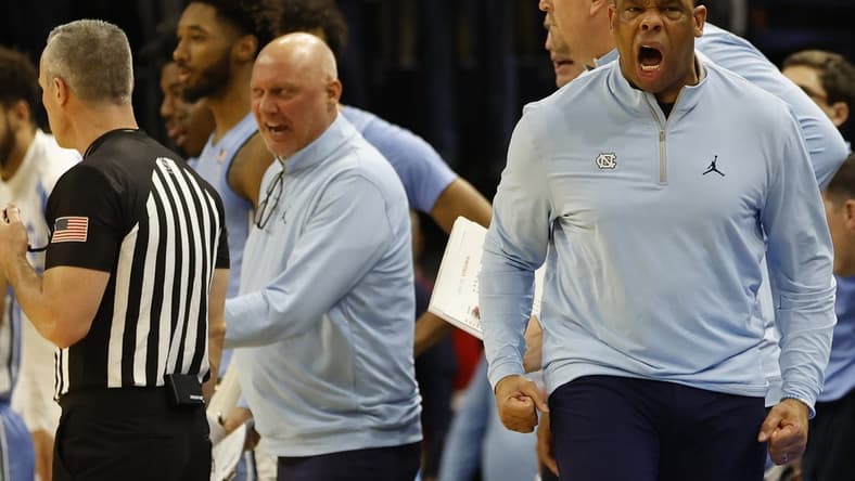 Jan 10, 2023; Charlottesville, Virginia, USA; North Carolina Tar Heels head coach Hubert Davis reacts on the bench against the Virginia Cavaliers in the first half at John Paul Jones Arena. Mandatory Credit: Geoff Burke-USA TODAY Sports