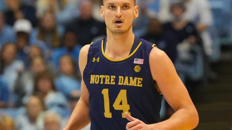 Jan 7, 2023; Chapel Hill, North Carolina, USA; Notre Dame Fighting Irish forward Nate Laszewski (14) looks on against the North Carolina Tar Heels during the first half at Dean E. Smith Center. Mandatory Credit: James Guillory-USA TODAY Sports