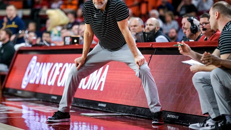 Oklahoma head coach Porter Moser stands on the sidelines in the second half during a college basketball game between the Oklahoma Sooners (OU) and the West Virginia Mountaineers at Lloyd Noble Center in Norman, Okla., Saturday, Jan. 14, 2023.
Ou Vs West Virginia