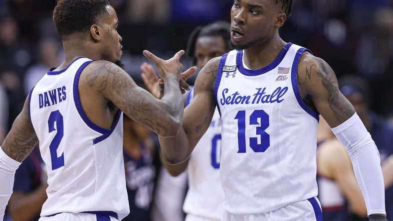 Jan 18, 2023; Newark, New Jersey, USA; Seton Hall Pirates forward KC Ndefo (13) celebrates with Seton Hall Pirates guard Al-Amir Dawes (2) after a basket during the second half against the Connecticut Huskies at Prudential Center. Mandatory Credit: Vincent Carchietta-USA TODAY Sports