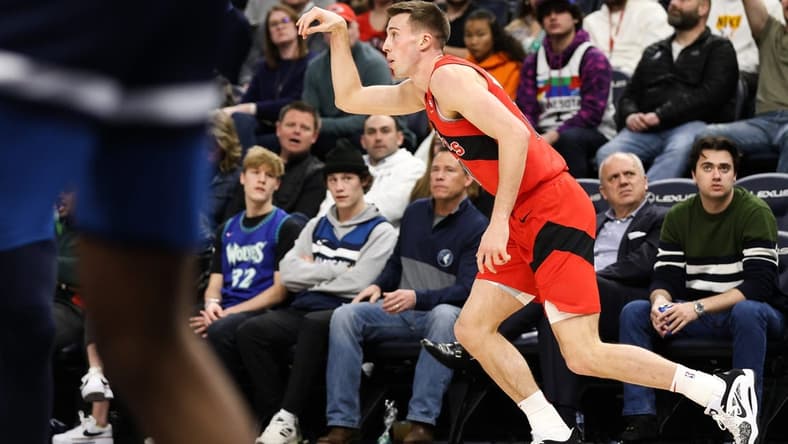 Jan 19, 2023; Minneapolis, Minnesota, USA; Toronto Raptors forward Joe Wieskamp (15) reacts to his shot against the Minnesota Timberwolves during the second quarter at Target Center. Mandatory Credit: Matt Krohn-USA TODAY Sports