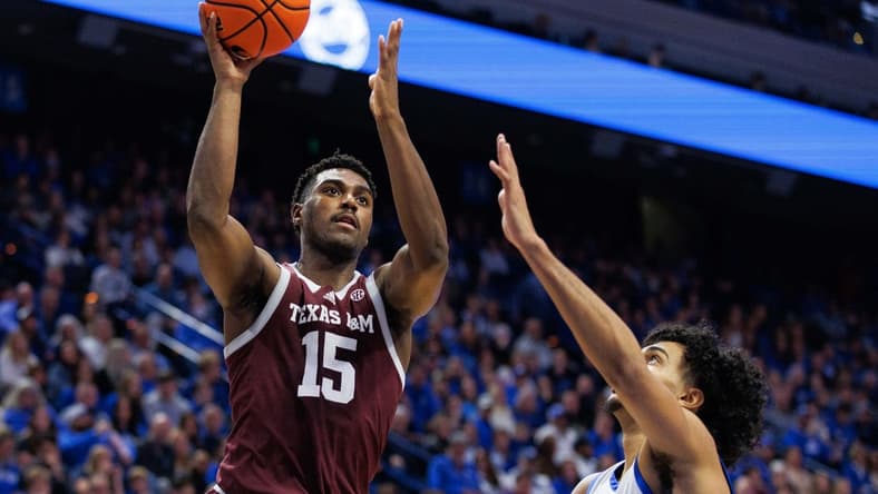 Jan 21, 2023; Lexington, Kentucky, USA; Texas A&M Aggies forward Henry Coleman III (15) shoots the ball during the first half against the Kentucky Wildcats at Rupp Arena at Central Bank Center. Mandatory Credit: Jordan Prather-USA TODAY Sports