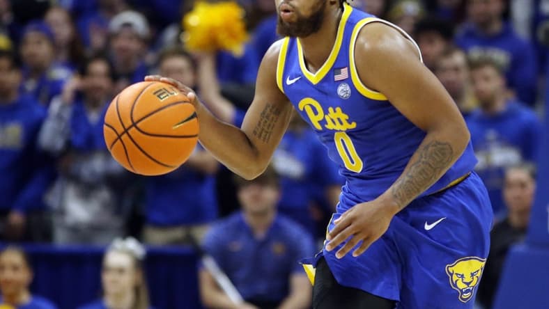 Jan 21, 2023; Pittsburgh, Pennsylvania, USA; Pittsburgh Panthers guard Nelly Cummings (0) brings the ball up court against the Florida State Seminoles during the second half at the Petersen Events Center. The Seminoles won 71-64. Mandatory Credit: Charles LeClaire-USA TODAY Sports