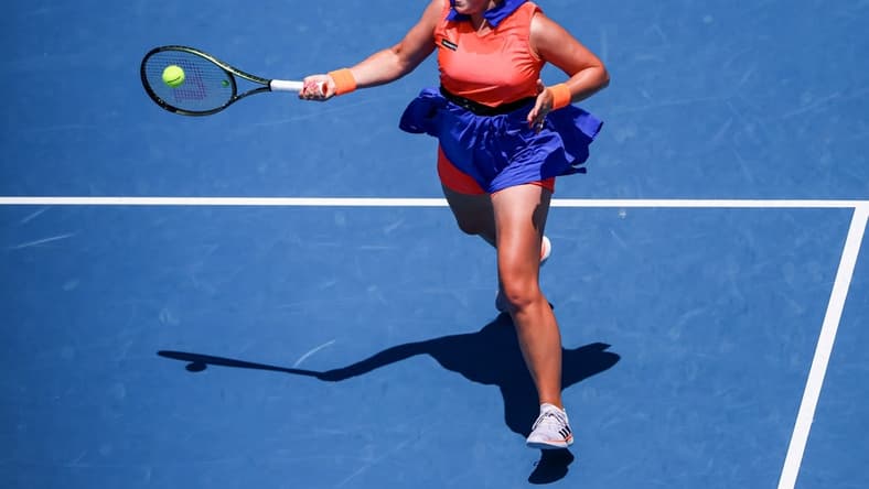 Jan 22, 2023; Melbourne, VICTORIA, Australia; Jelena Ostapenko from Latvia during her fourth round match against Coco Gauff from the United States on day seven of the 2023 Australian Open tennis tournament at Melbourne Park. Mandatory Credit: Mike Frey-USA TODAY Sports