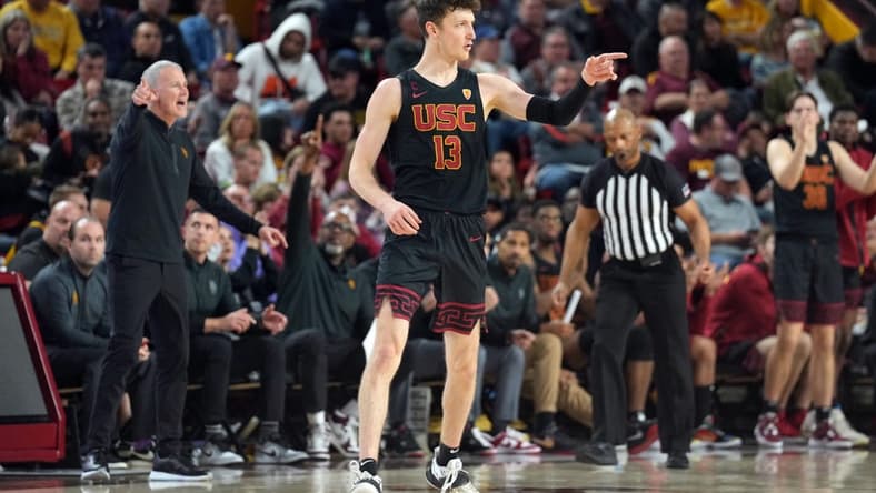 Jan 21, 2023; Tempe, Arizona, USA; USC Trojans guard Drew Peterson (13) reacts after making a three point basket against the Arizona State Sun Devils during the second half at Desert Financial Arena. Mandatory Credit: Joe Camporeale-USA TODAY Sports