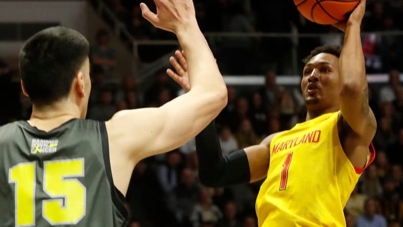 Purdue Boilermakers center Zach Edey (15) defends the shot of Maryland Terrapins guard Jahmir Young (1) during the NCAA men s basketball game, Sunday, Jan. 22, 2023, at Mackey Arena in West Lafayette, Ind. Purdue won 58-55.
Purmary012223 Am08521