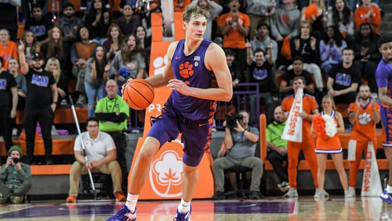 Jan 24, 2023; Clemson, South Carolina, USA; Clemson Tigers forward Hunter Tyson (5) moves the ball up court agianst the Georgia Tech Yellow Jackets during the second half at Littlejohn Coliseum. Mandatory Credit: Ken Ruinard-USA TODAY Sports