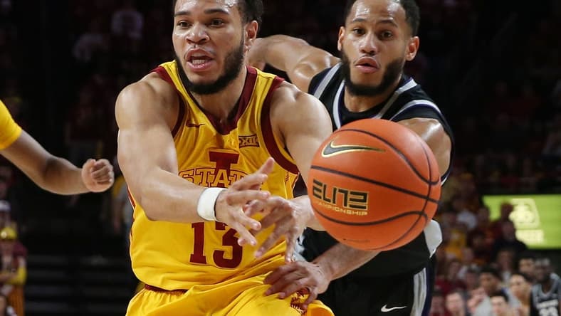 Iowa State University Cyclones guard Jaren Holmes (13) and Kansas State Wildcats guard Markquis Nowell (1) battle for the ball during the second half at Hilton Coliseum Tuesday, 2023, in Ames, Iowa.

Kansas State And Iowa State Men S Basketball