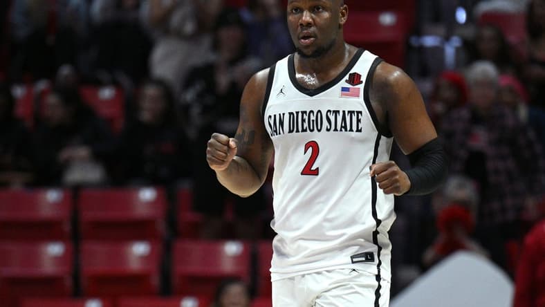 Jan 25, 2023; San Diego, California, USA; San Diego State Aztecs guard Adam Seiko (2) celebrates on the court after defeating the Utah State Aggies at Viejas Arena. Mandatory Credit: Orlando Ramirez-USA TODAY Sports