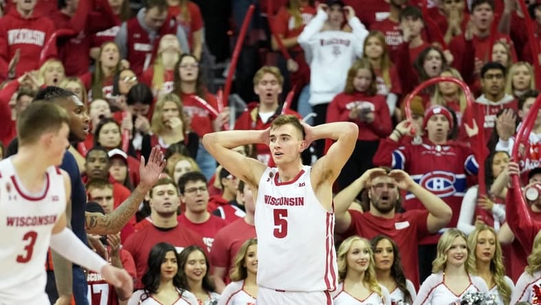Jan 28, 2023; Madison, Wisconsin, USA;  Wisconsin Badgers forward Tyler Wahl (5) reacts to a foul call during the second half against the Illinois Fighting Illini at the Kohl Center. Mandatory Credit: Kayla Wolf-USA TODAY Sports