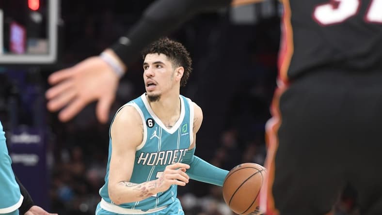 Jan 29, 2023; Charlotte, North Carolina, USA; Charlotte Hornets guard LaMelo Ball (1) looks to pass during the second half against the Miami Heat at the Spectrum Center. Mandatory Credit: Sam Sharpe-USA TODAY Sports