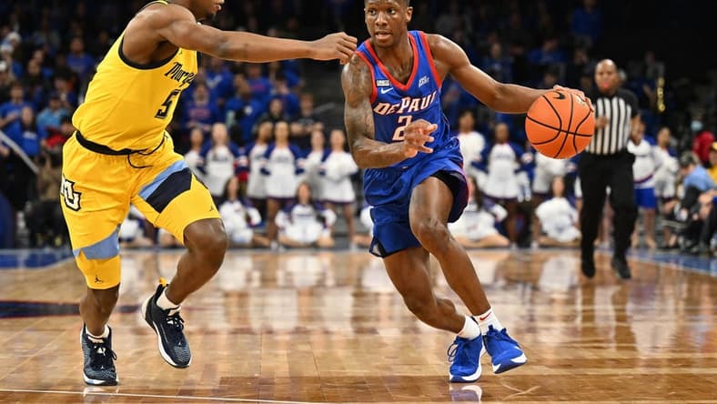 Jan 28, 2023; Chicago, Illinois, USA;  DePaul Blue Demons guard Umoja Gibson (2) controls the ball against the Marquette Golden Eagles at Wintrust Arena. Marquette defeated DePaul 89-69. Mandatory Credit: Jamie Sabau-USA TODAY Sports