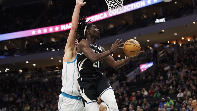 Jan 31, 2023; Milwaukee, Wisconsin, USA;  Milwaukee Bucks guard Jrue Holiday (21) shoots during the first quarter against the Charlotte Hornets at Fiserv Forum. Mandatory Credit: Jeff Hanisch-USA TODAY Sports