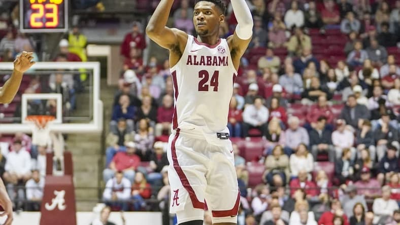 Jan 31, 2023; Tuscaloosa, Alabama, USA; Alabama Crimson Tide forward Brandon Miller (24) shoots against the Vanderbilt Commodores during the second half at Coleman Coliseum. Mandatory Credit: Marvin Gentry-USA TODAY Sports