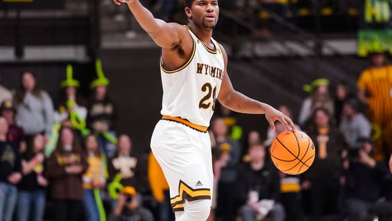 Jan 31, 2023; Laramie, Wyoming, USA; Wyoming Cowboys guard Ethan Anderson (20) calls a play during the second half against the Fresno State Bulldogs at Arena-Auditorium. Mandatory Credit: Troy Babbitt-USA TODAY Sports