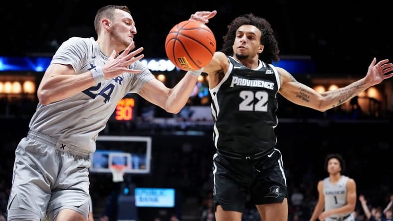 Xavier Musketeers forward Jack Nunge (24) and Providence Friars guard Devin Carter (22) compete for a rebound in the first half of a college basketball game between the Providence Friars and the Xavier Musketeers, Wednesday, Feb. 1, 2023, at Cintas Center in Cincinnati.
Providence Friars At Xavier Musketeers Feb 1 0041