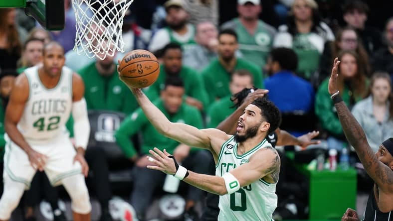 Feb 1, 2023; Boston, Massachusetts, USA; Boston Celtics forward Jayson Tatum (0) drives to the basket against the Brooklyn Nets in the second quarter at TD Garden. Mandatory Credit: David Butler II-USA TODAY Sports
