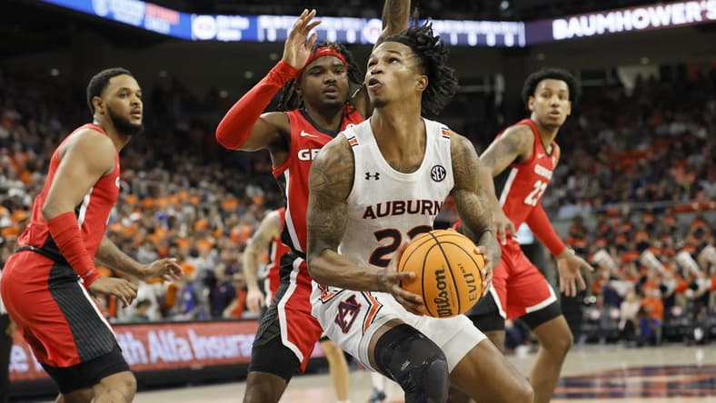 Feb 1, 2023; Auburn, Alabama, USA; Auburn Tigers guard Allen Flanigan (22) goes for a shot against the Georgia Bulldogs during the second half at Neville Arena. Mandatory Credit: John Reed-USA TODAY Sports
