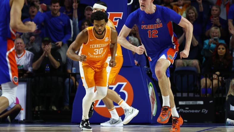 Feb 1, 2023; Gainesville, Florida, USA;Florida Gators forward Colin Castleton (12) celebrates after he makes a basket against the Tennessee Volunteers during the second half at Exactech Arena at the Stephen C. O'Connell Center. Mandatory Credit: Kim Klement-USA TODAY Sports