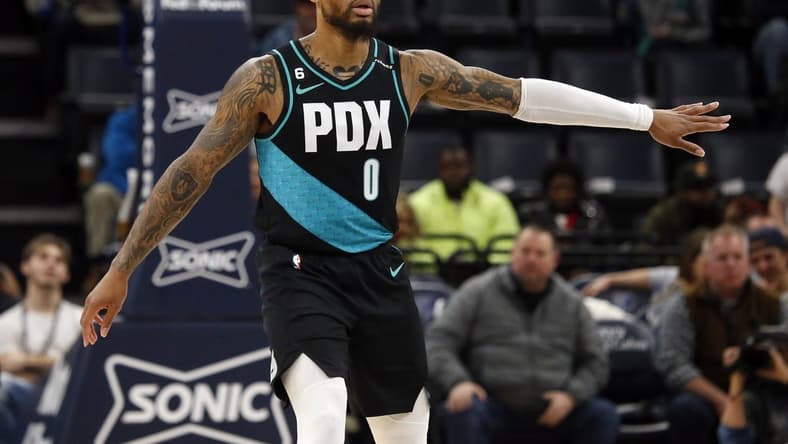 Feb 1, 2023; Memphis, Tennessee, USA; Portland Trail Blazers guard Damian Lillard (0) reacts after a basket during the first half against the Memphis Grizzlies at FedExForum. Mandatory Credit: Petre Thomas-USA TODAY Sports