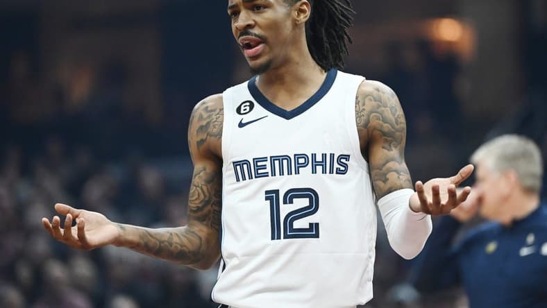 Feb 2, 2023; Cleveland, Ohio, USA; Memphis Grizzlies guard Ja Morant (12) reacts to a call during the first half against the Cleveland Cavaliers at Rocket Mortgage FieldHouse. Mandatory Credit: Ken Blaze-USA TODAY Sports