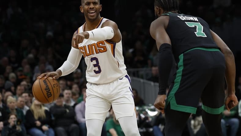 Feb 3, 2023; Boston, Massachusetts, USA; Phoenix Suns guard Chris Paul (3) directs teammates against the Boston Celtics during the first quarter at TD Garden. Mandatory Credit: Winslow Townson-USA TODAY Sports