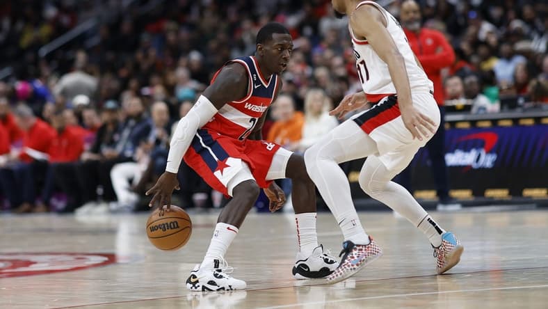 Feb 3, 2023; Washington, District of Columbia, USA; Washington Wizards guard Kendrick Nunn (20) dribbles the ball as Portland Trail Blazers guard Shaedon Sharpe (17) defends in the fourth quarter at Capital One Arena. Mandatory Credit: Geoff Burke-USA TODAY Sports