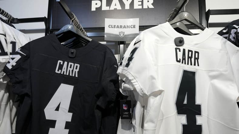 Feb 3, 2023; Las Vegas, NV, USA; A clearance sale on the jerseys of Las Vegas Raiders quarterback Derek Carr (4) at the Raider Image team store at Allegiant Stadium. Mandatory Credit: Kirby Lee-USA TODAY Sports