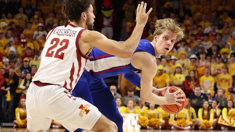 Feb 4, 2023; Ames, Iowa, USA; Iowa State Cyclones guard Gabe Kalscheur (22) defends Kansas Jayhawks guard Gradey Dick (4) during the first half at James H. Hilton Coliseum. Mandatory Credit: Reese Strickland-USA TODAY Sports
