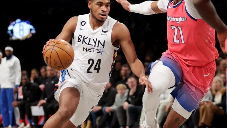 Feb 4, 2023; Brooklyn, New York, USA; Brooklyn Nets guard Cam Thomas (24) drives to the basket against Washington Wizards center Daniel Gafford (21) during the first quarter at Barclays Center. Mandatory Credit: Brad Penner-USA TODAY Sports