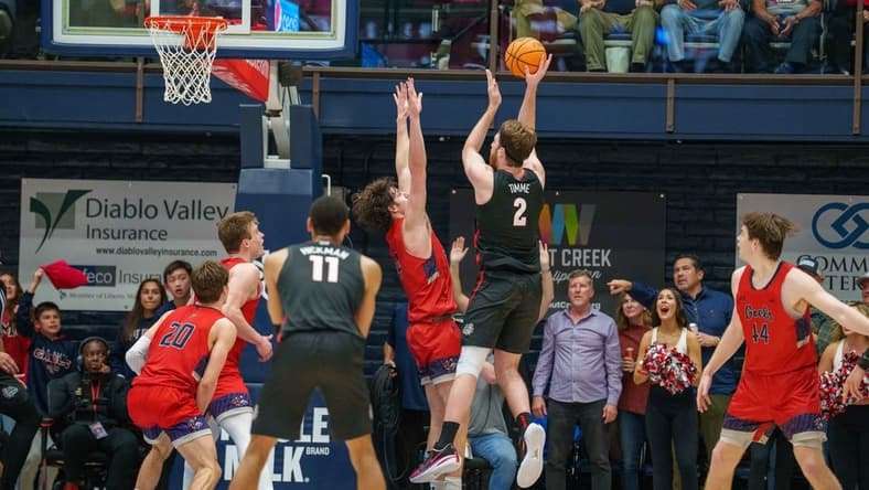 Feb 4, 2023; Moraga, California, USA; Gonzaga Bulldogs forward Drew Timme (2) shoots the basketball over St. Mary's Gaels forward Kyle Bowen (14) during overtime at University Credit Union Pavilion. Mandatory Credit: Neville E. Guard-USA TODAY Sports